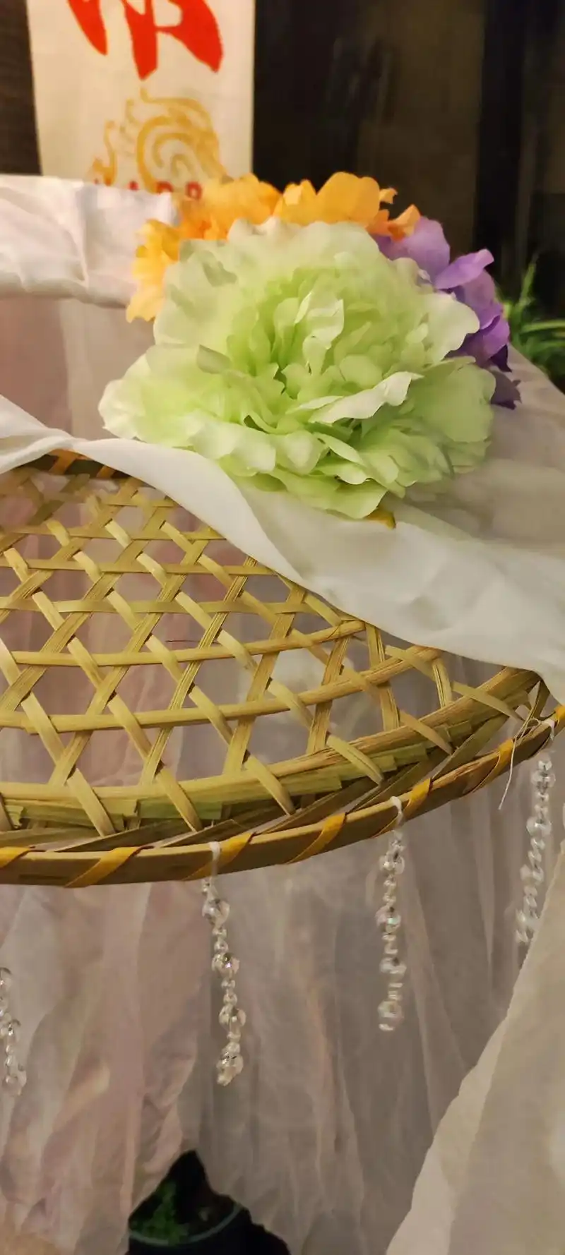 Ceremonial conical hat with cultural symbols